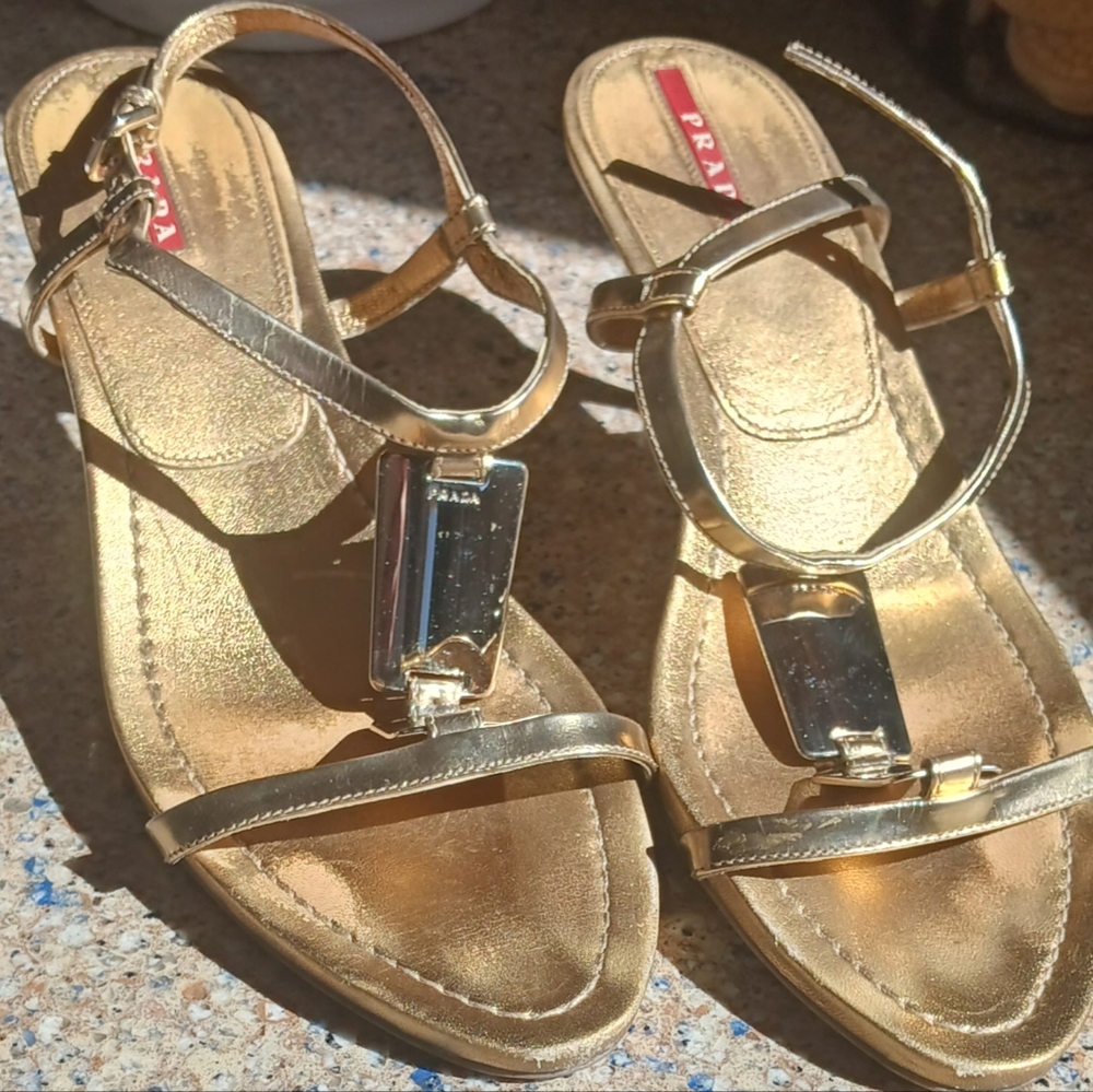 Prada 3 inch heels. Size 8. Strappy metallic gold leather with bold metal Prada